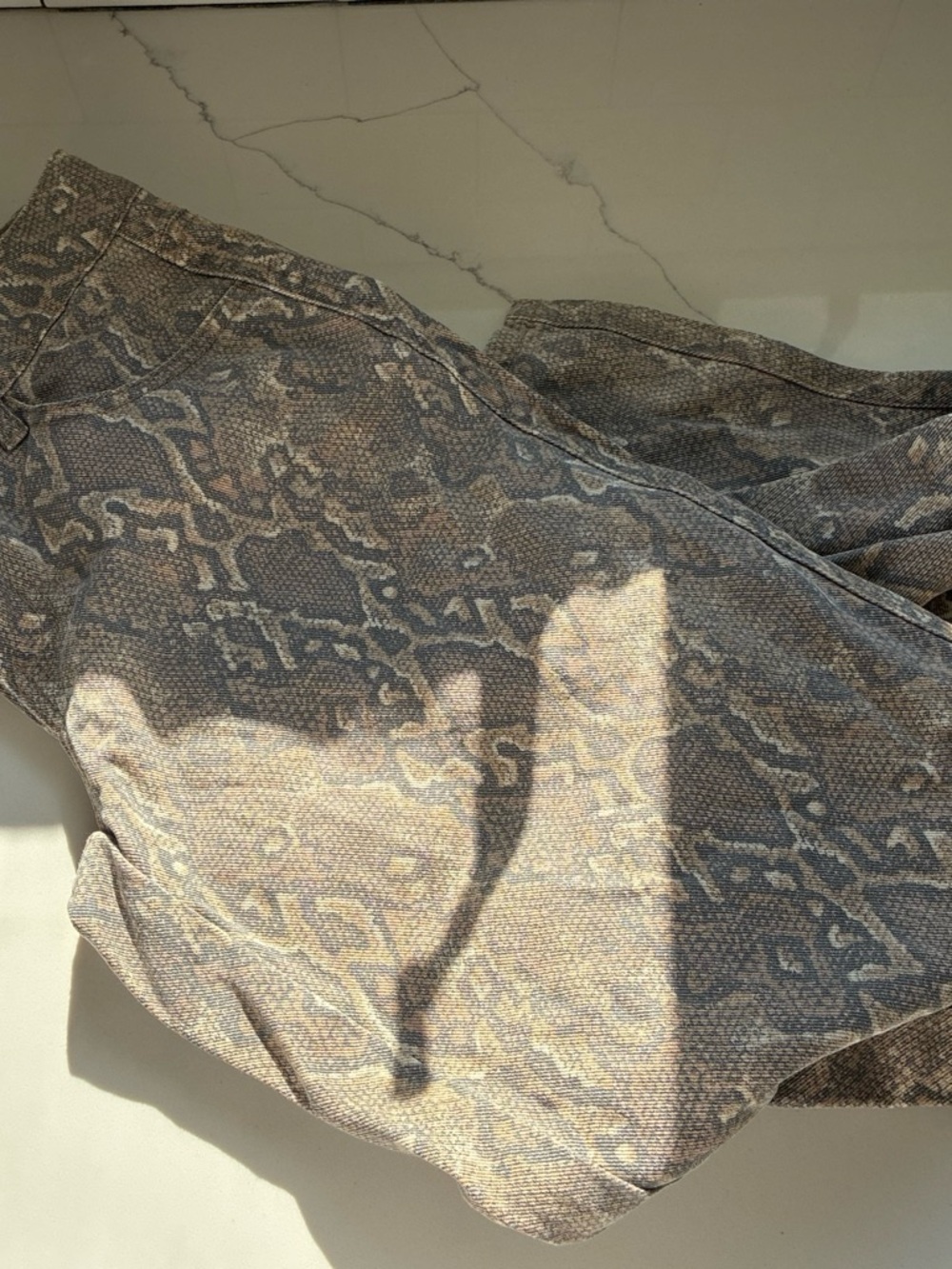 Snakeskin reptile print jeans